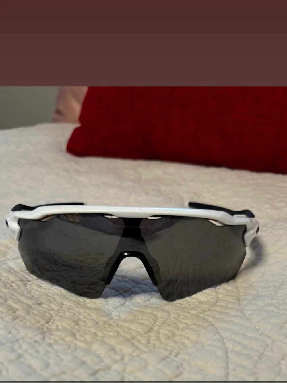 Oakley White Frame Radar EV PATH Prizm black polarized lenses.